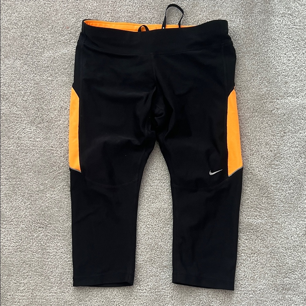 Nike Black Leggings with Vibrant Orange Panels